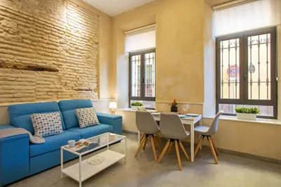 Zona de estar de Nine O Clock San Agustin Suites