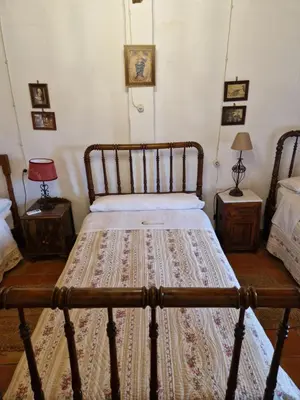 Cama o camas de una habitación en Colonos Alojamientos Rurales