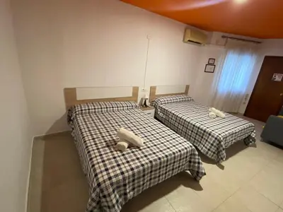 Cama o camas de una habitación en Arc House Ribera Only Adults