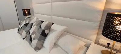 Cama o camas de una habitación en GRUPO LIMCOTEL PERLAS dE LA AXERQUIA