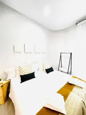 Cama o camas de una habitación en Alojamiento Hermanos Garnelo