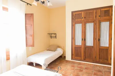 Cama o camas de una habitación en Casa Rural Aire
