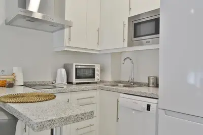 Una cocina o zona de cocina en SunShine Cruz Conde