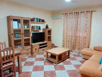 Una televisión o centro de entretenimiento en Dos casas rurales en Despeñaperros, La Reconquista y Nuevas Poblaciones