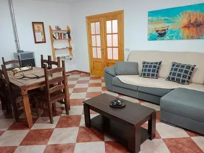Zona de estar de Dos casas rurales en Despeñaperros, La Reconquista y Nuevas Poblaciones
