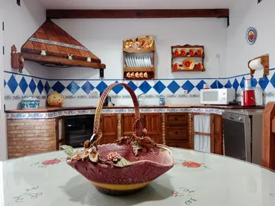 Una cocina o zona de cocina en Dos casas rurales en Despeñaperros, La Reconquista y Nuevas Poblaciones