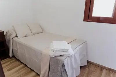 Cama o camas de una habitación en El Almezo