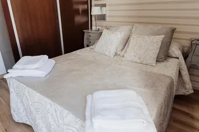 Cama o camas de una habitación en El Almezo