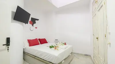 Cama o camas de una habitación en Guesthouse Room & Studio Seville La Flamenka