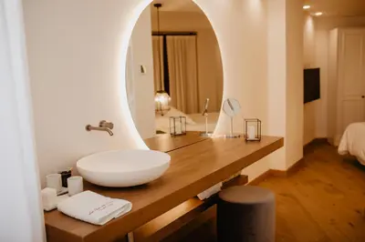 Cama o camas de una habitación en La Ermita Suites - Único Hotel Monumento de Córdoba