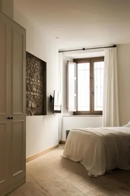 Cama o camas de una habitación en La Ermita Suites - Único Hotel Monumento de Córdoba