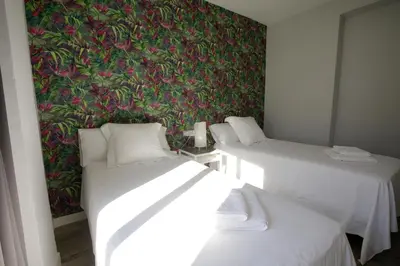 Cama o camas de una habitación en Ático Casa Lola