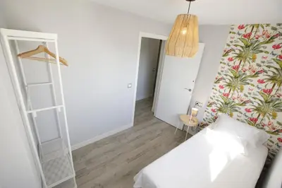 Cama o camas de una habitación en Ático Casa Lola