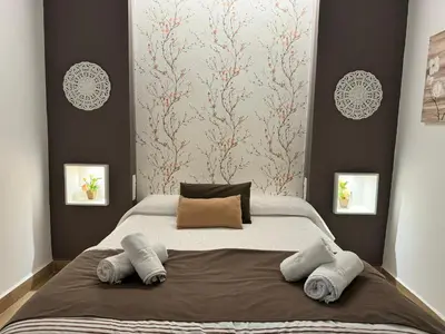 Cama o camas de una habitación en Noches de Córdoba