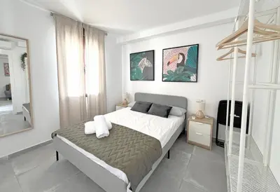 Cama o camas de una habitación en Mezquita Apartamento