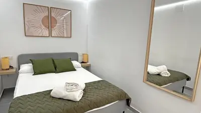 Cama o camas de una habitación en Mezquita Apartamento