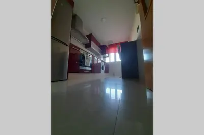 Una cocina o zona de cocina en Piso céntrico con piscina,parking y jacuzzi