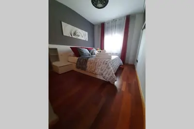 Cama o camas de una habitación en Piso céntrico con piscina,parking y jacuzzi