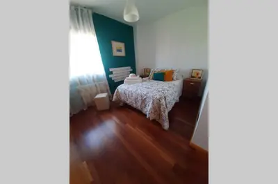 Cama o camas de una habitación en Piso céntrico con piscina,parking y jacuzzi
