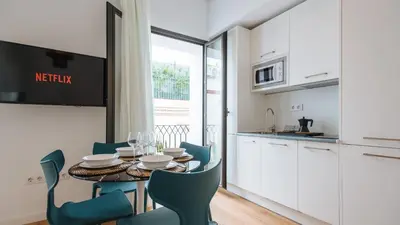 Una cocina o zona de cocina en Alameda 1851 - Terrace and jacuzzi
