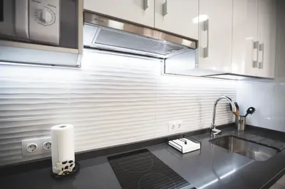Una cocina o zona de cocina en Apartamento PASEO DE LA RIBERA