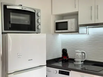 Una cocina o zona de cocina en Apartamento PASEO DE LA RIBERA