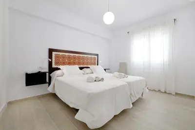 Cama o camas de una habitación en San Basilio, Parking Incluido Junto al Casco Histórico