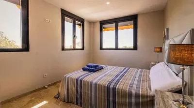 Cama o camas de una habitación en La terraza del Puente y Mezqt-Catedral