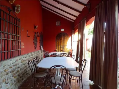 Un restaurante o sitio para comer en Casa D Mis Dos Gitanillas