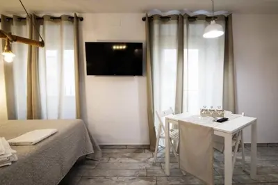 Cama o camas de una habitación en Vivienda turística Lagarto de Jaén
