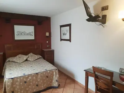 Cama o camas de una habitación en Pensión Ana Pilar