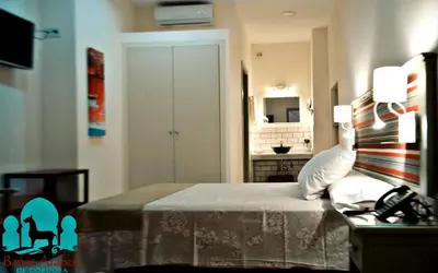 Cama o camas de una habitación en Hospedería Baños Arabes de Córdoba Dos