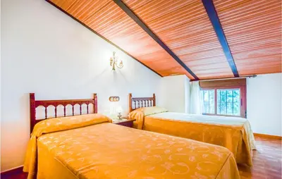 Cama o camas de una habitación en 3 Bedroom Amazing Home In Rute