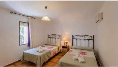 Cama o camas de una habitación en Casa Rural la Joya