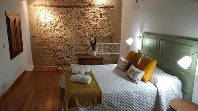 Cama o camas de una habitación en La Casita de Papel Alhama de Granada