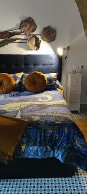 Cama o camas de una habitación en El nido de la Jabonería