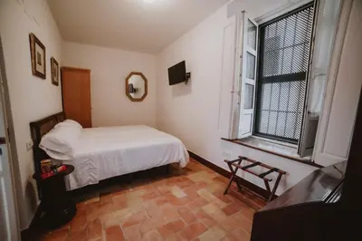 Cama o camas de una habitación en Posada La Casa Del Pintor