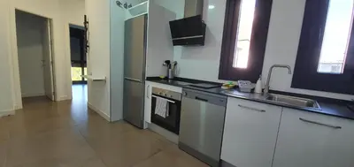 Una cocina o zona de cocina en CARLOS APARTAMENTo