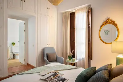Cama o camas de una habitación en Genteel Home Alhóndiga Sevilla