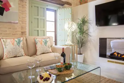 Una televisión o centro de entretenimiento en Judería de Sevilla V - Luxury Apartments
