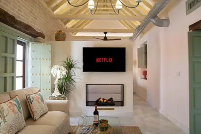 Una televisión o centro de entretenimiento en Judería de Sevilla V - Luxury Apartments