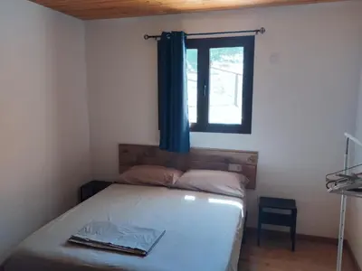 Cama o camas de una habitación en Cortijo Rural Gumeo