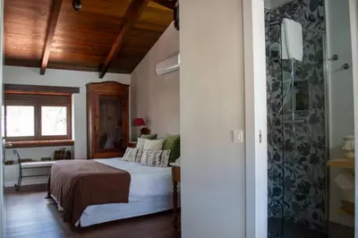 Cama o camas de una habitación en CASA RURAL TRES VENTAS
