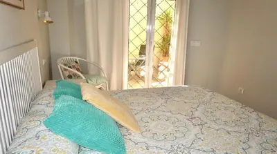 Cama o camas de una habitación en Sevilla Alameda PG Apartamentos