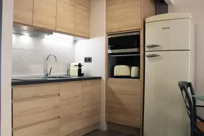 Una cocina o zona de cocina en Sevilla Torneo PG Apartamentos