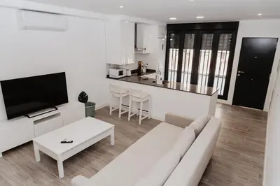 Una televisión o centro de entretenimiento en Nuevo y cómodo loft junto a la Mezquita