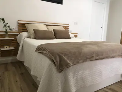 Cama o camas de una habitación en Vivienda Turística Jaén Interior PARKING GRATUITO