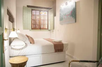 Cama o camas de una habitación en Judería de Sevilla III - Luxury Apartments