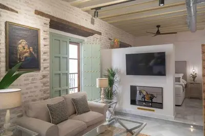 Una televisión o centro de entretenimiento en Judería de Sevilla III - Luxury Apartments