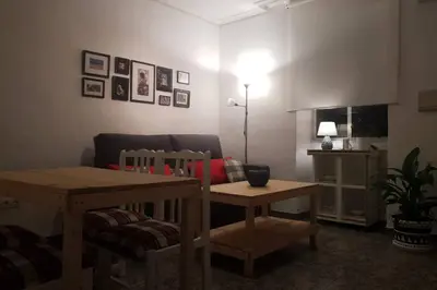 Zona de estar de Bonito y coqueto apartamento